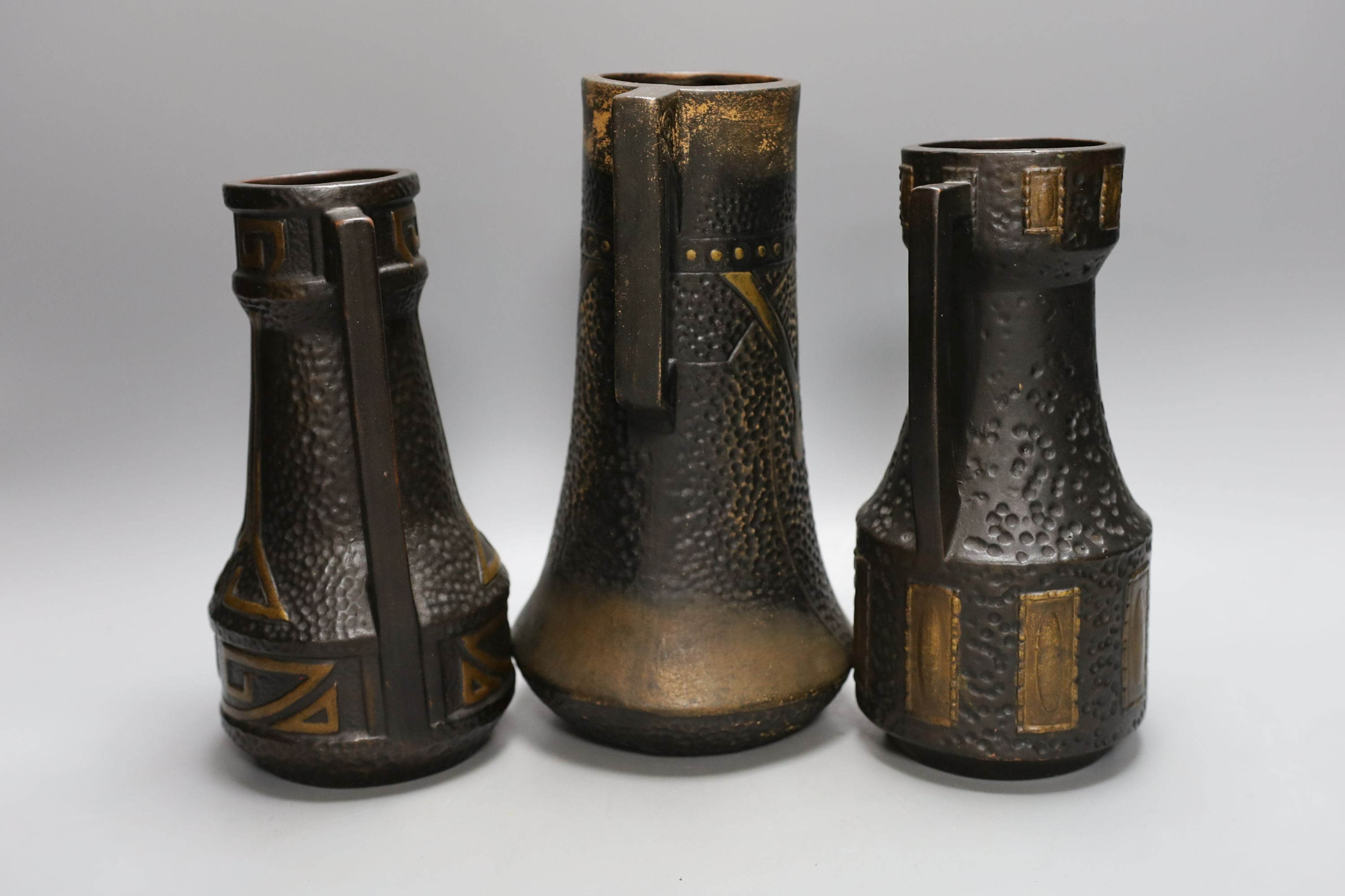 Three Bretby Arts and Crafts style pottery vases - tallest 26cm